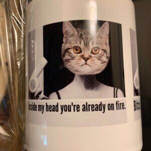 Standard four-inch Mug with Subversive Little Cat graphics (11 ounces)